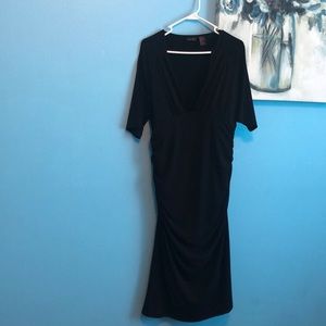 Black spandex and polyester body shaping dress